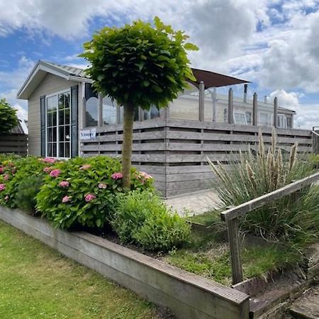 Chalet Makkum C99B Met Prive Gelegen Tuin Aan Het Water Zewnętrze zdjęcie